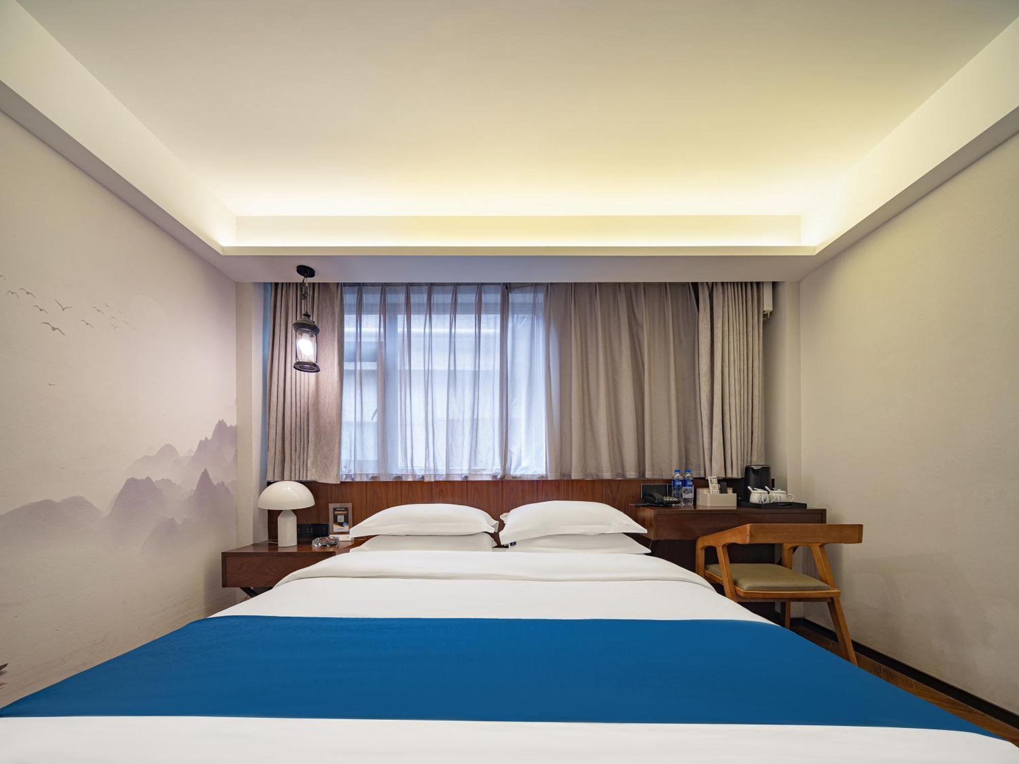 張家界武陵源北岸輕奢客棧 森林公園店 Hotel Zhangjiajie Buitenkant foto