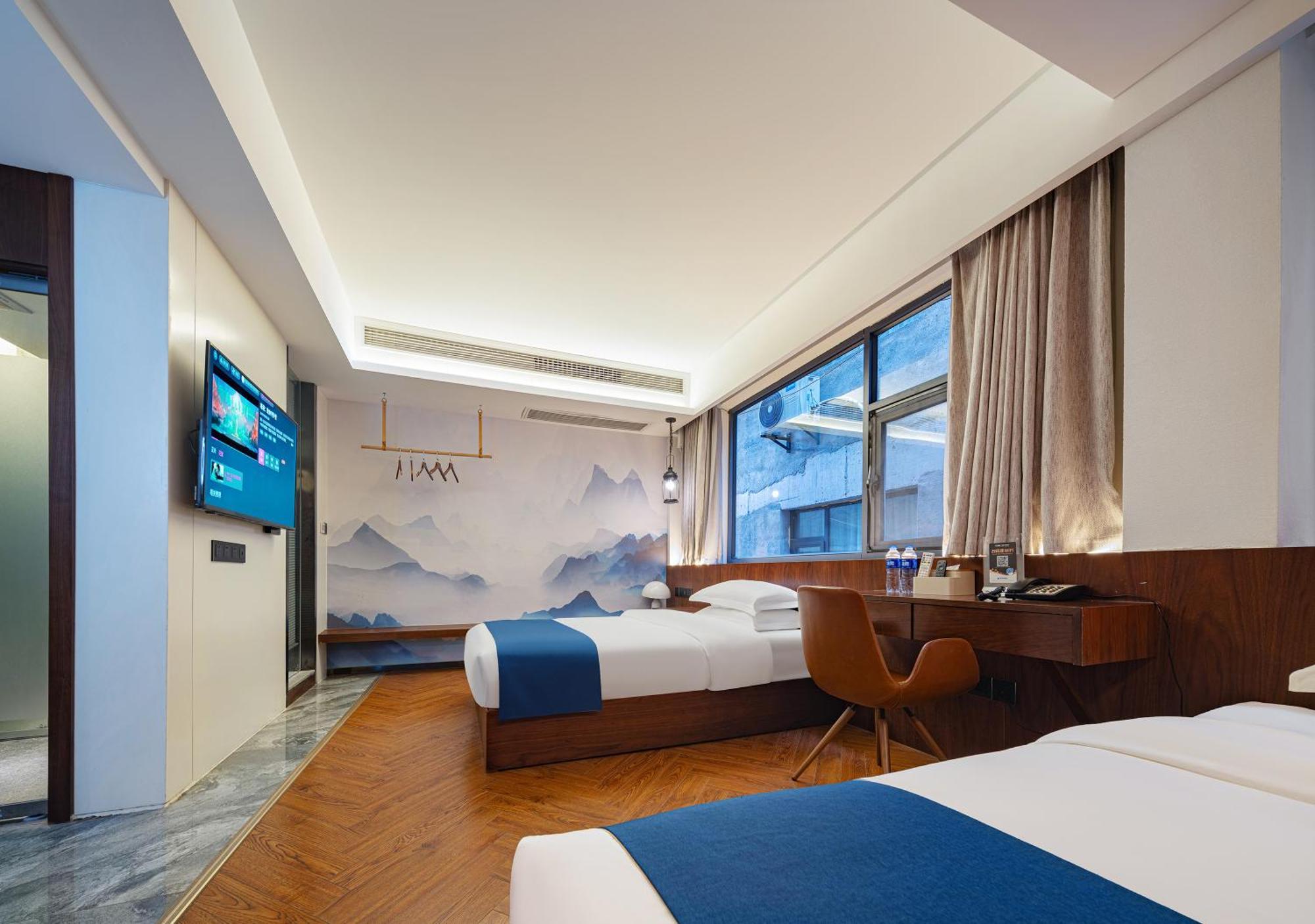 張家界武陵源北岸輕奢客棧 森林公園店 Hotel Zhangjiajie Buitenkant foto