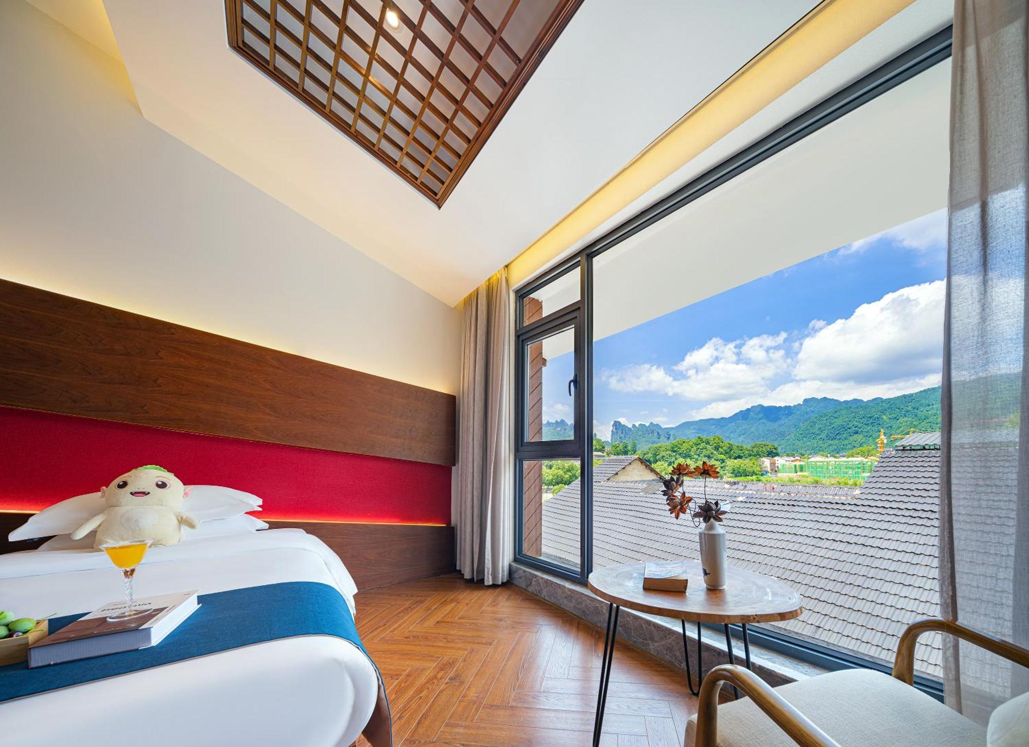 張家界武陵源北岸輕奢客棧 森林公園店 Hotel Zhangjiajie Buitenkant foto