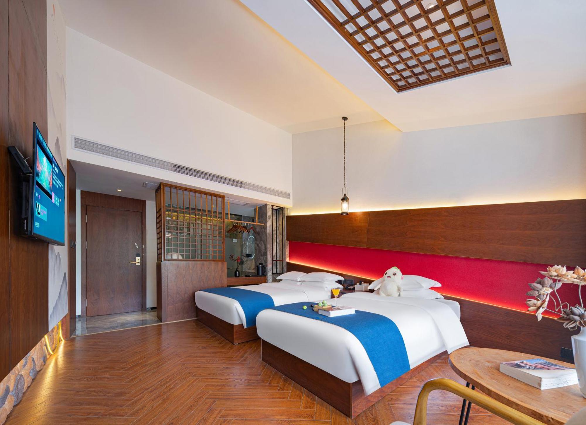 張家界武陵源北岸輕奢客棧 森林公園店 Hotel Zhangjiajie Buitenkant foto