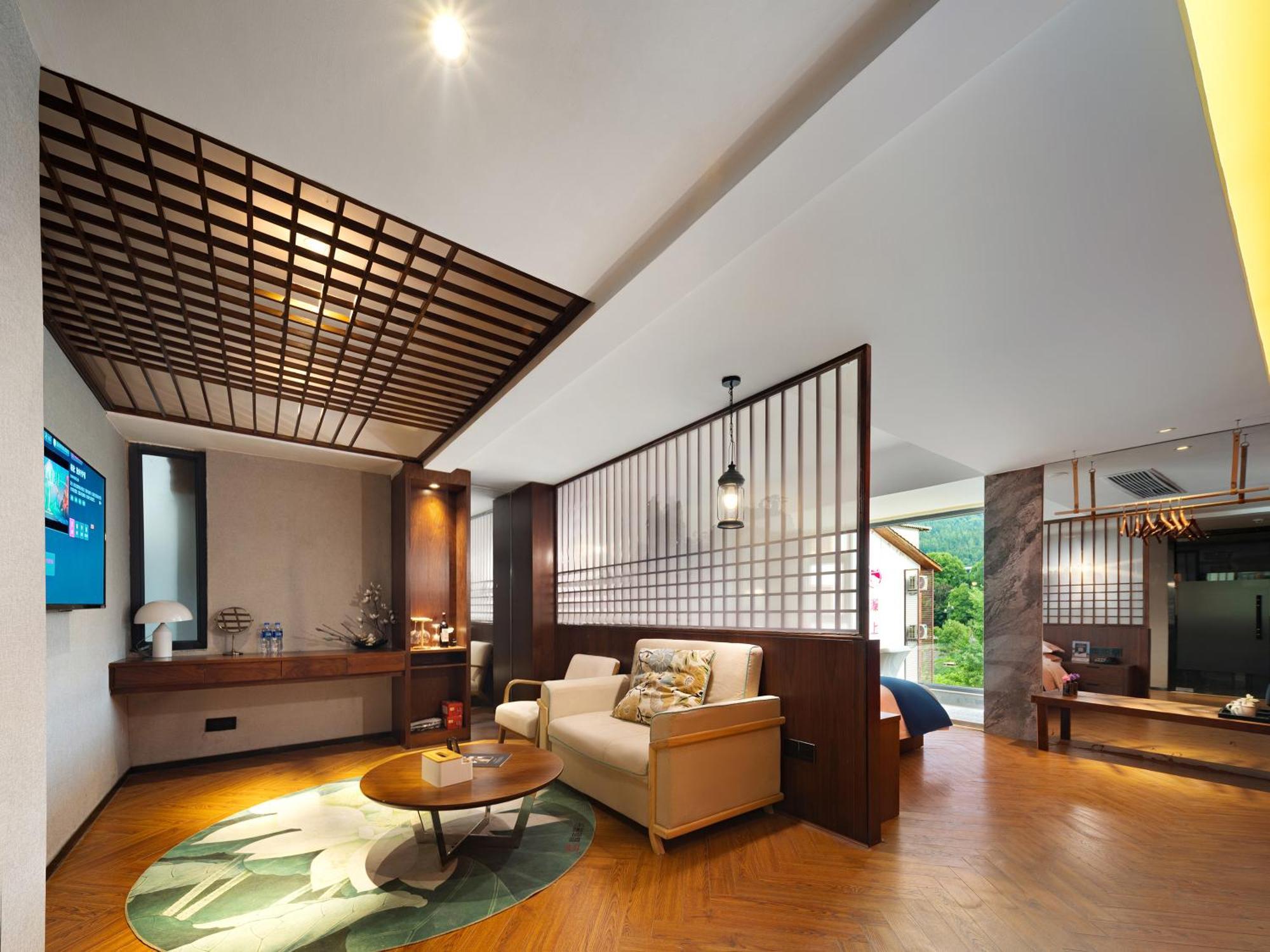 張家界武陵源北岸輕奢客棧 森林公園店 Hotel Zhangjiajie Buitenkant foto