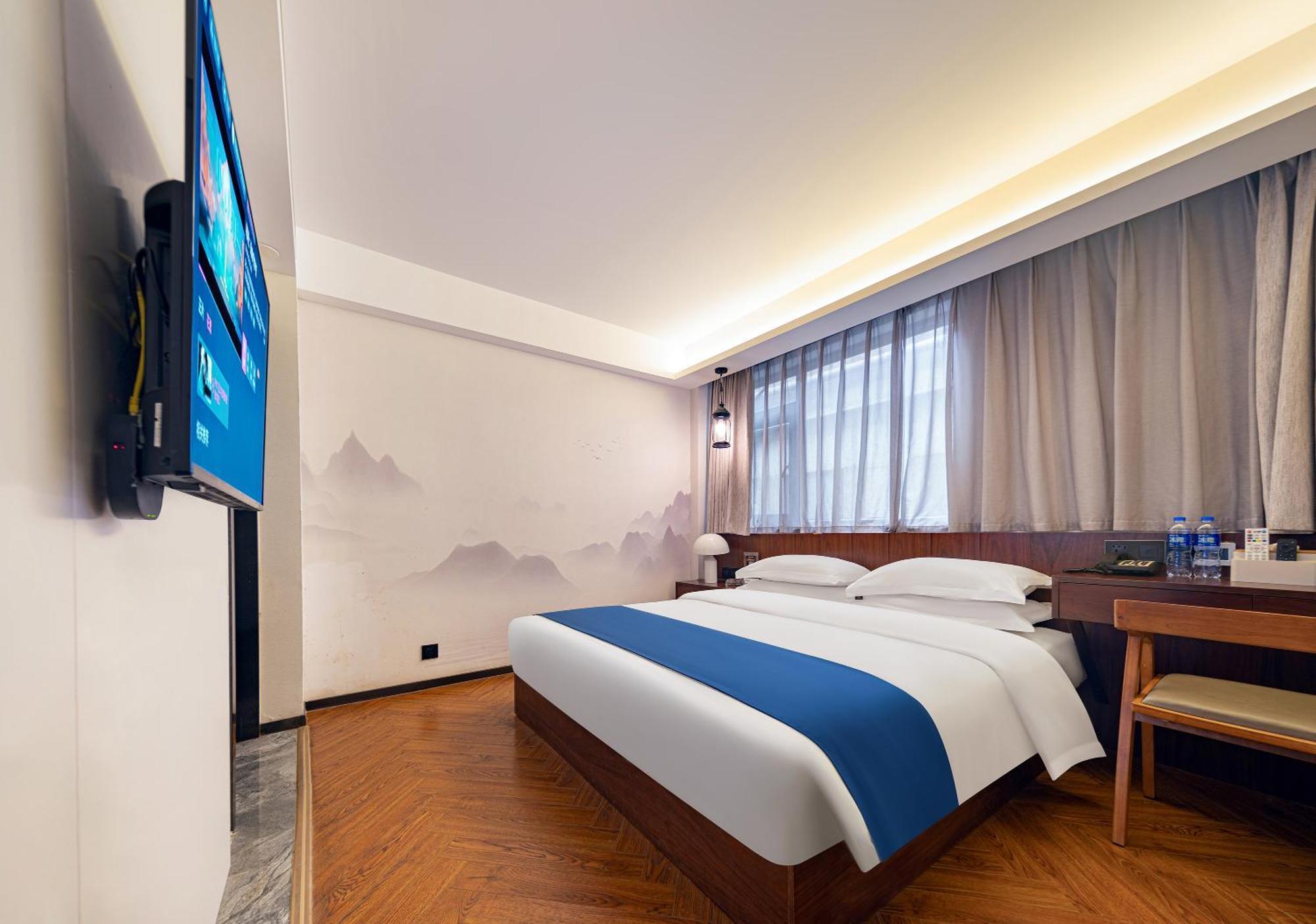 張家界武陵源北岸輕奢客棧 森林公園店 Hotel Zhangjiajie Buitenkant foto
