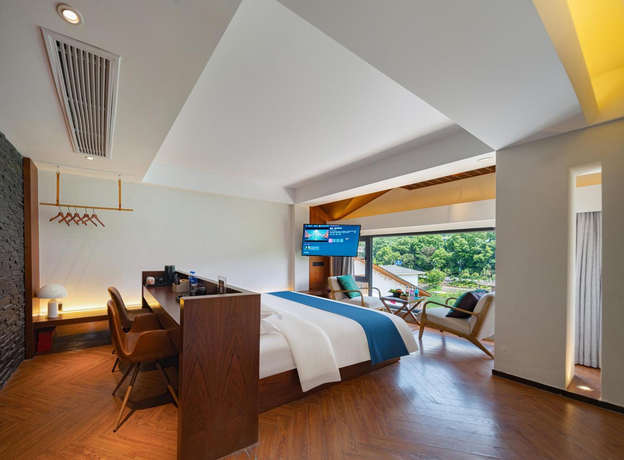 張家界武陵源北岸輕奢客棧 森林公園店 Hotel Zhangjiajie Buitenkant foto