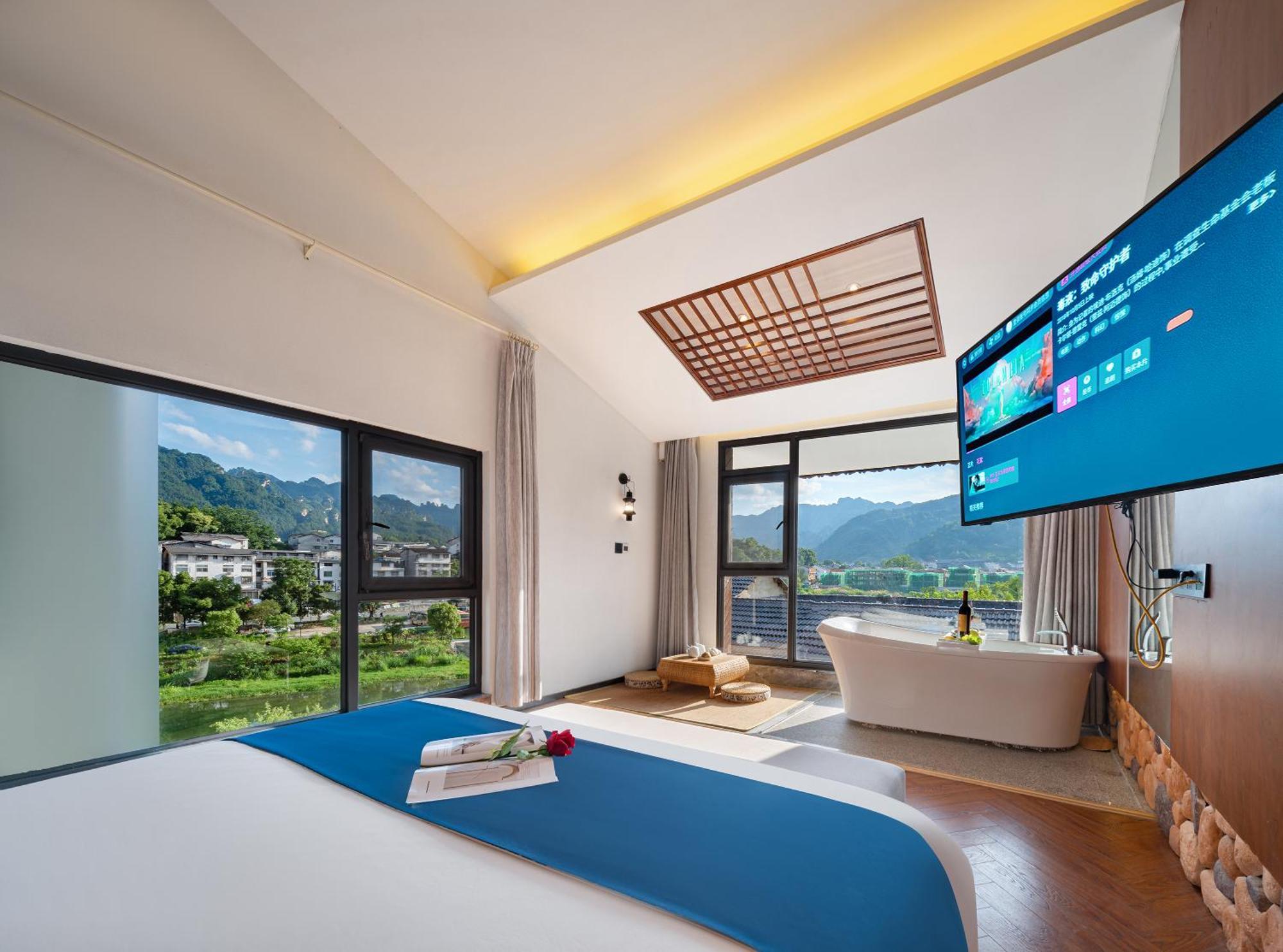 張家界武陵源北岸輕奢客棧 森林公園店 Hotel Zhangjiajie Buitenkant foto