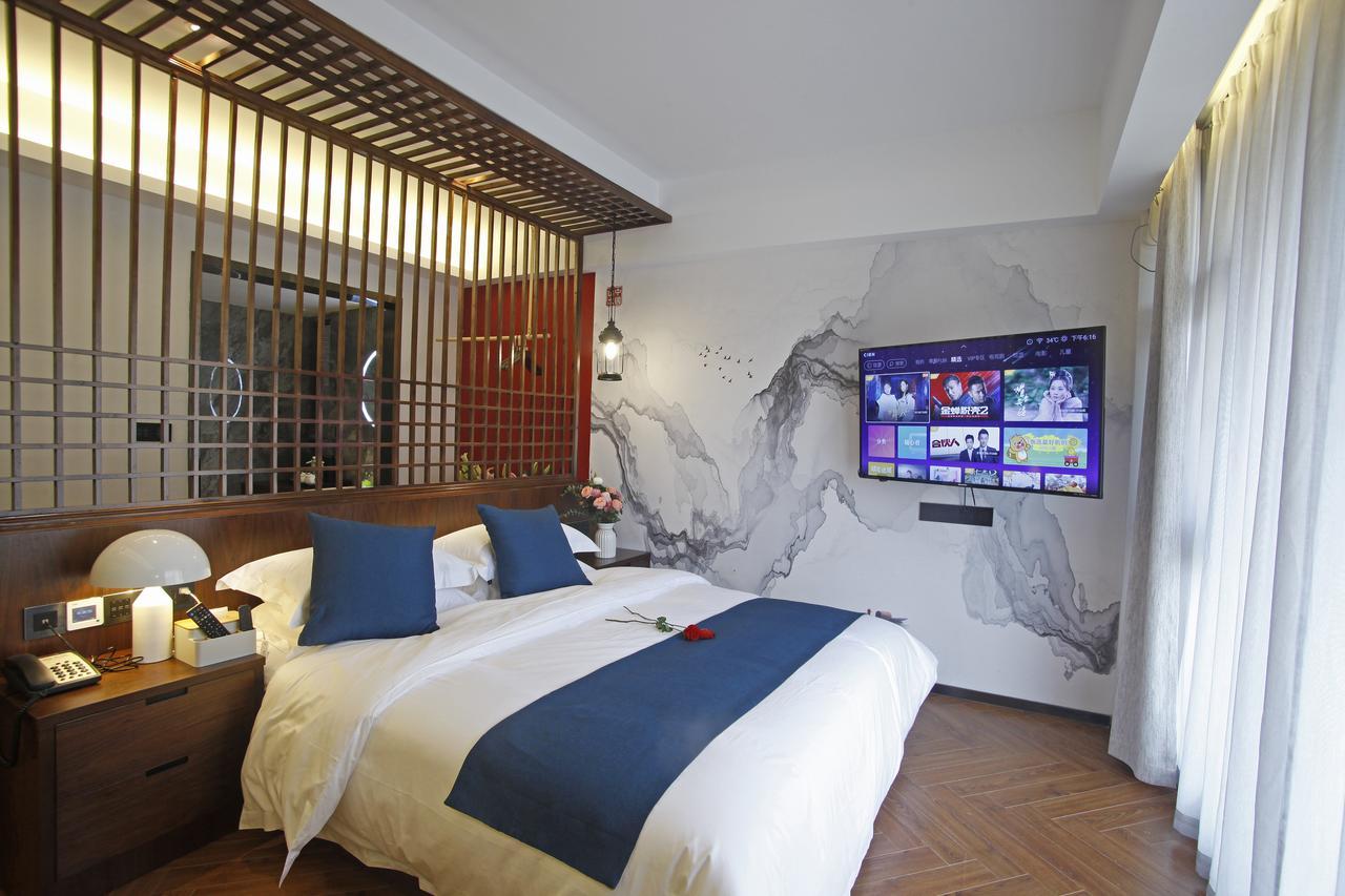 張家界武陵源北岸輕奢客棧 森林公園店 Hotel Zhangjiajie Buitenkant foto