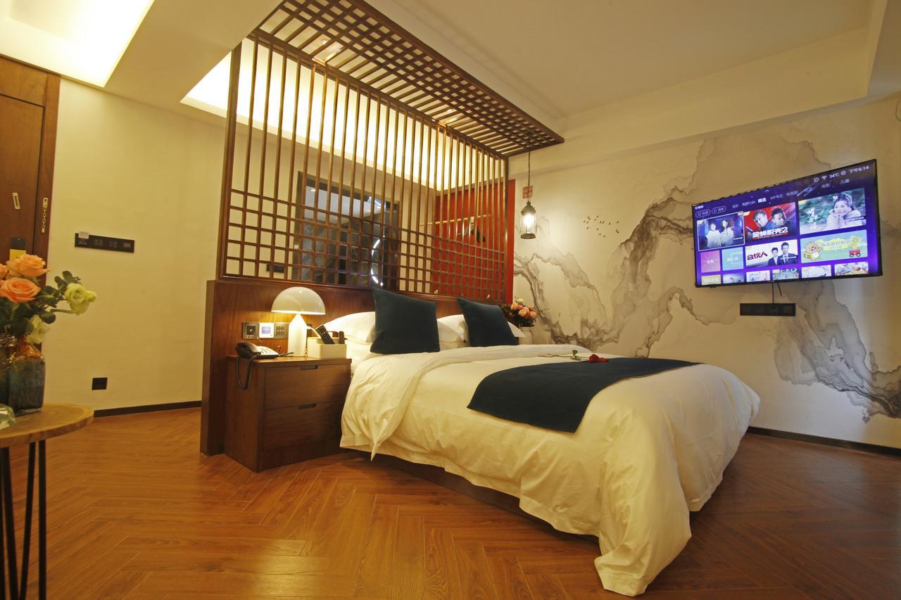 張家界武陵源北岸輕奢客棧 森林公園店 Hotel Zhangjiajie Buitenkant foto
