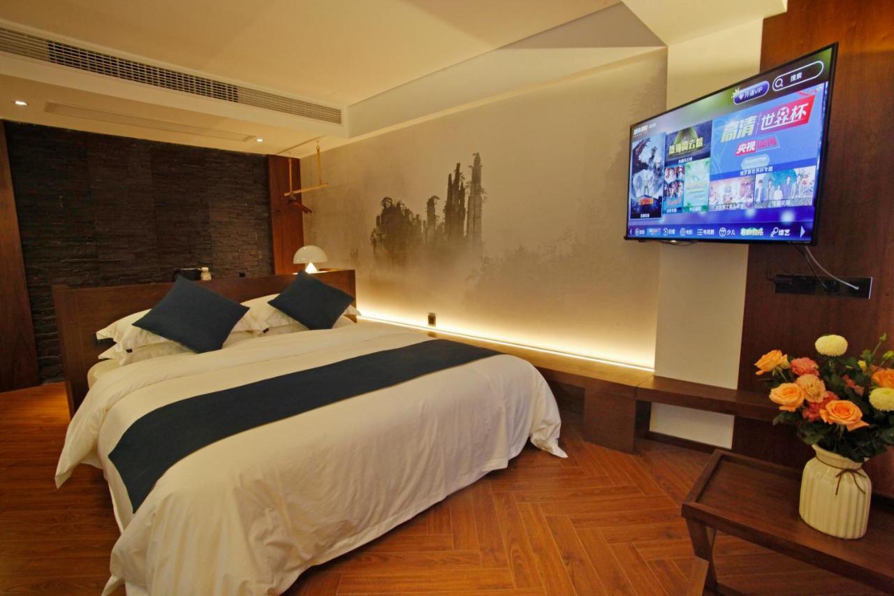張家界武陵源北岸輕奢客棧 森林公園店 Hotel Zhangjiajie Buitenkant foto