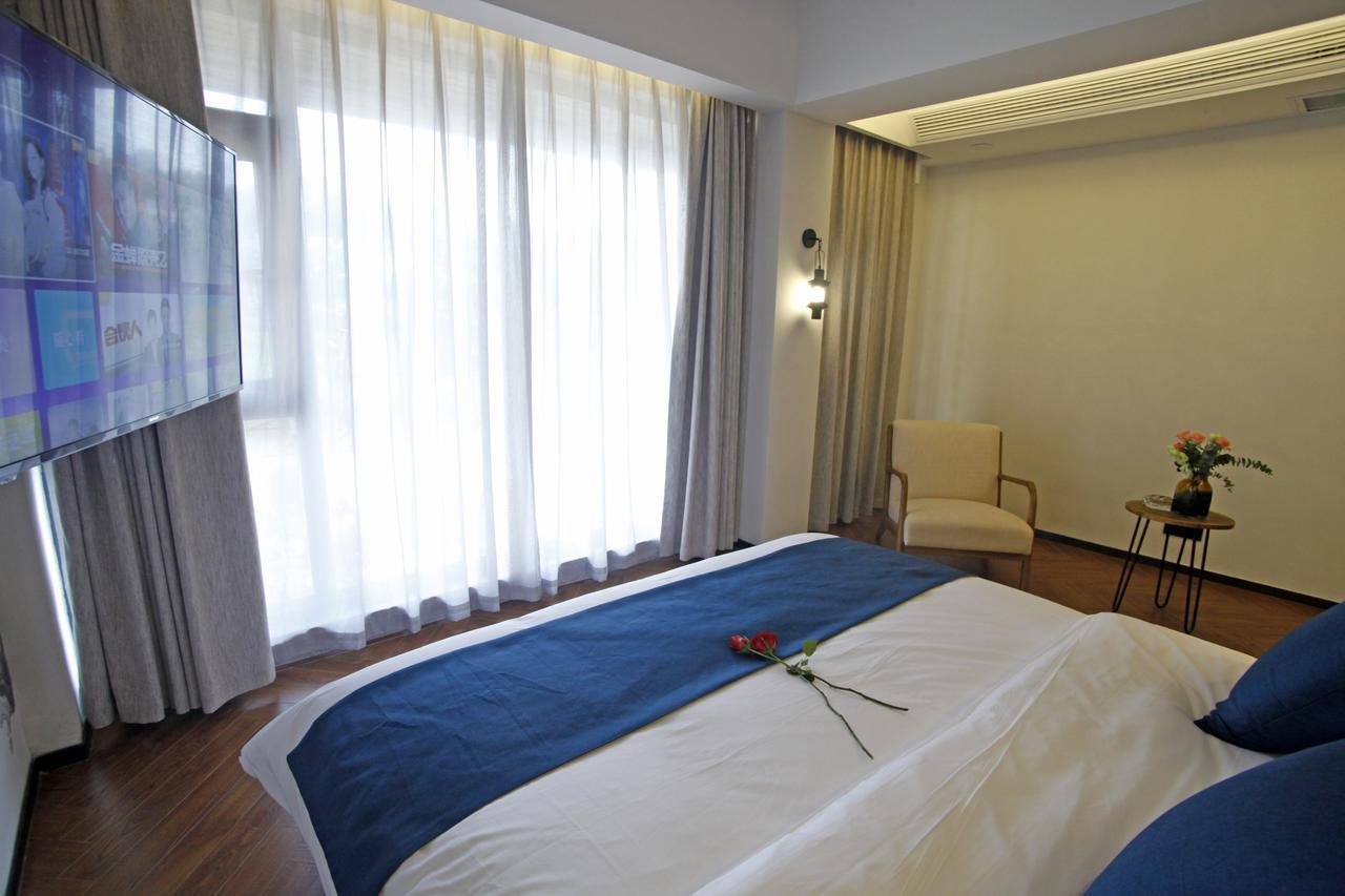 張家界武陵源北岸輕奢客棧 森林公園店 Hotel Zhangjiajie Buitenkant foto