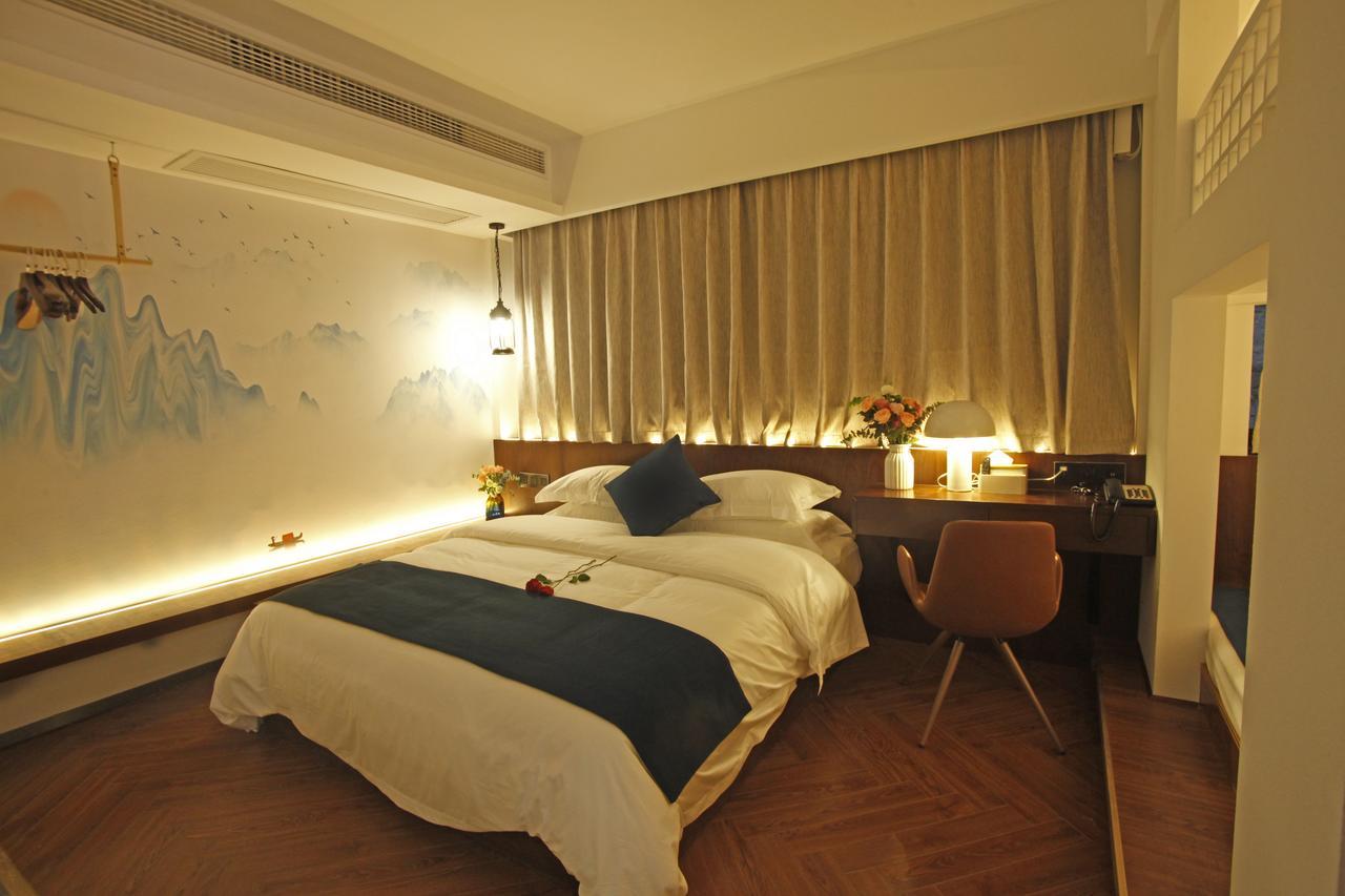 張家界武陵源北岸輕奢客棧 森林公園店 Hotel Zhangjiajie Buitenkant foto