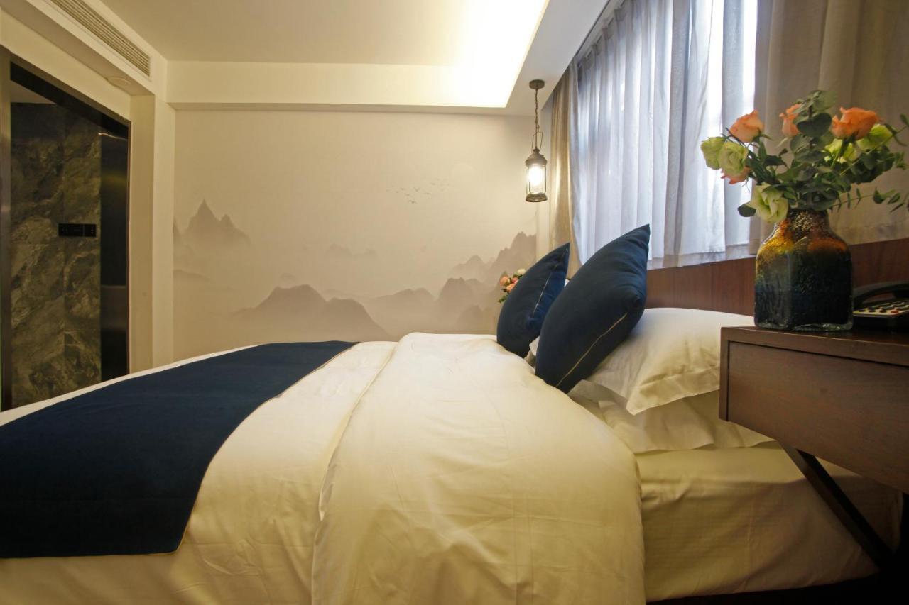 張家界武陵源北岸輕奢客棧 森林公園店 Hotel Zhangjiajie Buitenkant foto