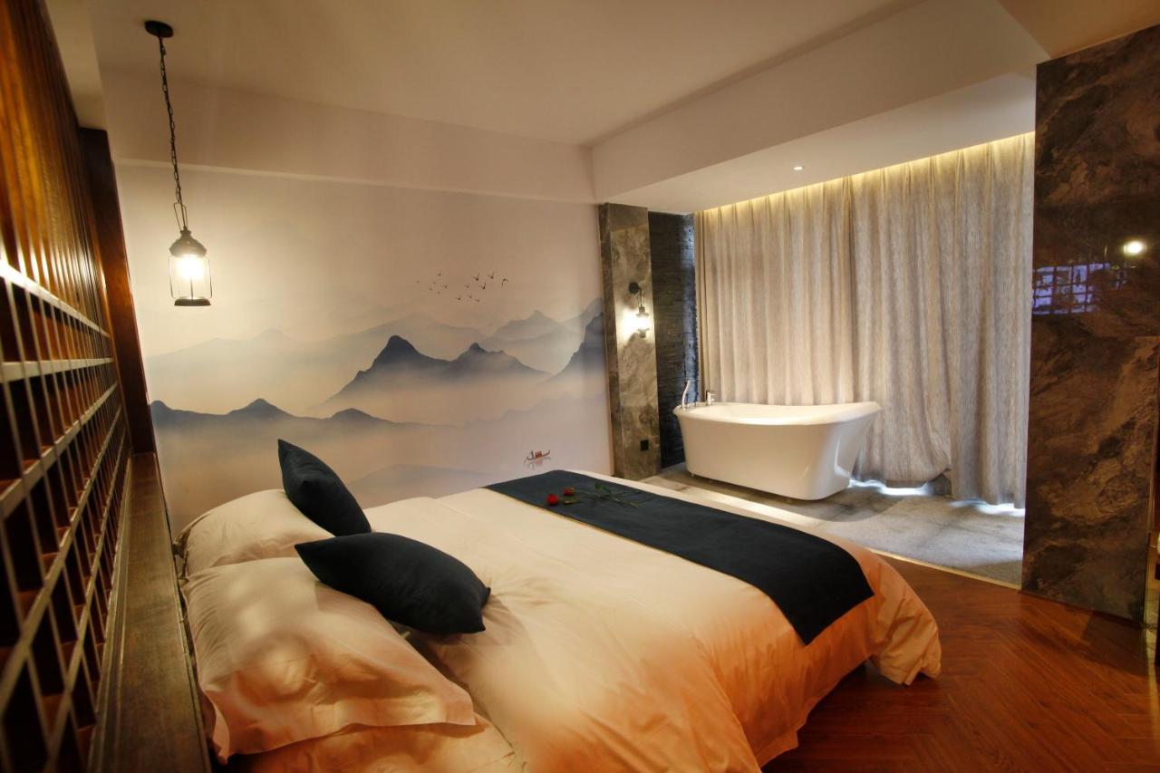 張家界武陵源北岸輕奢客棧 森林公園店 Hotel Zhangjiajie Buitenkant foto