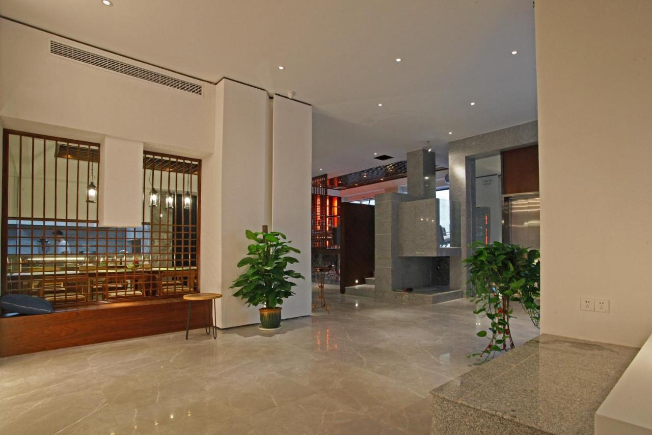 張家界武陵源北岸輕奢客棧 森林公園店 Hotel Zhangjiajie Buitenkant foto